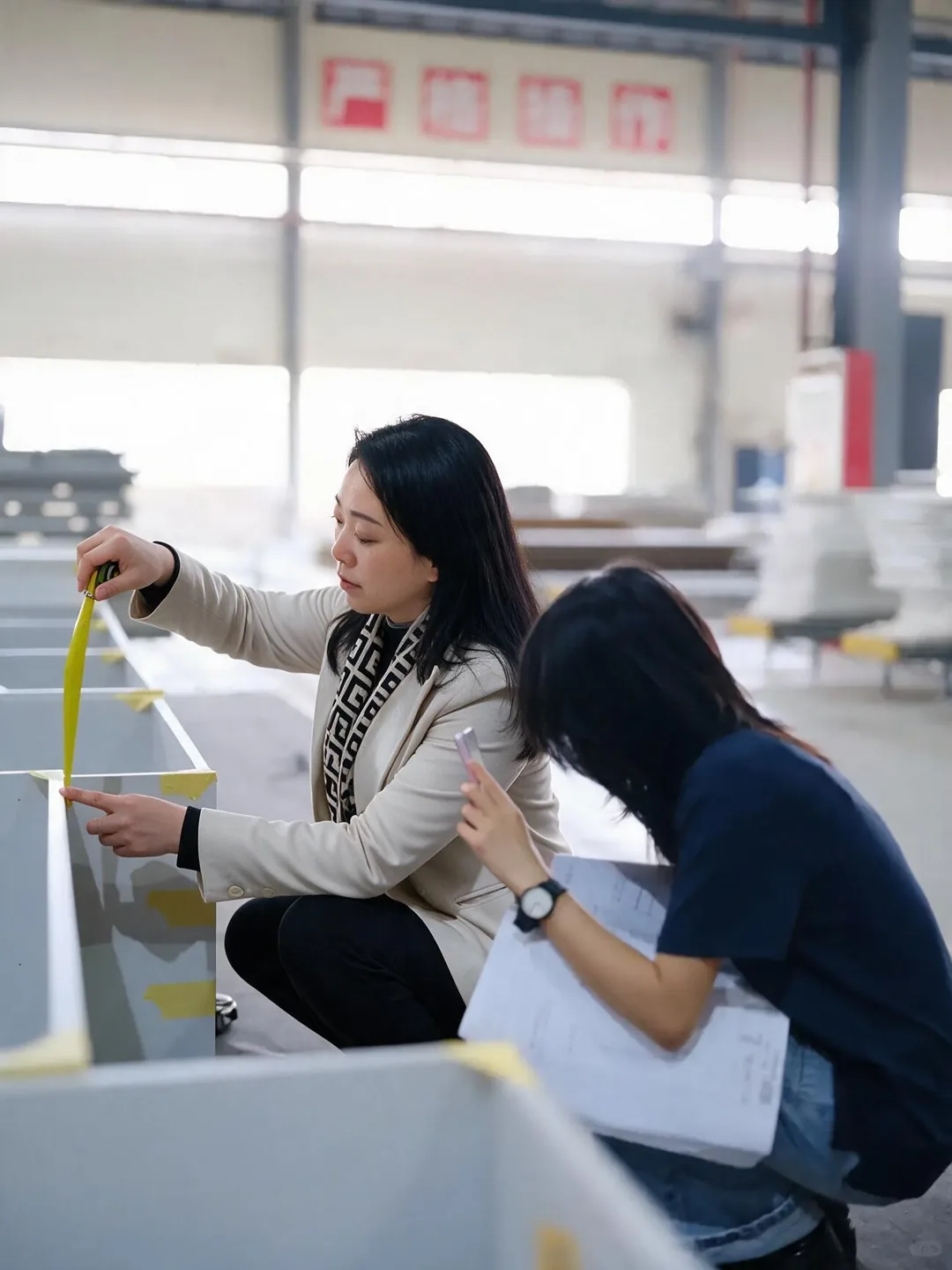 YUESHAN team checking custom furniture construction, materials and workmanship